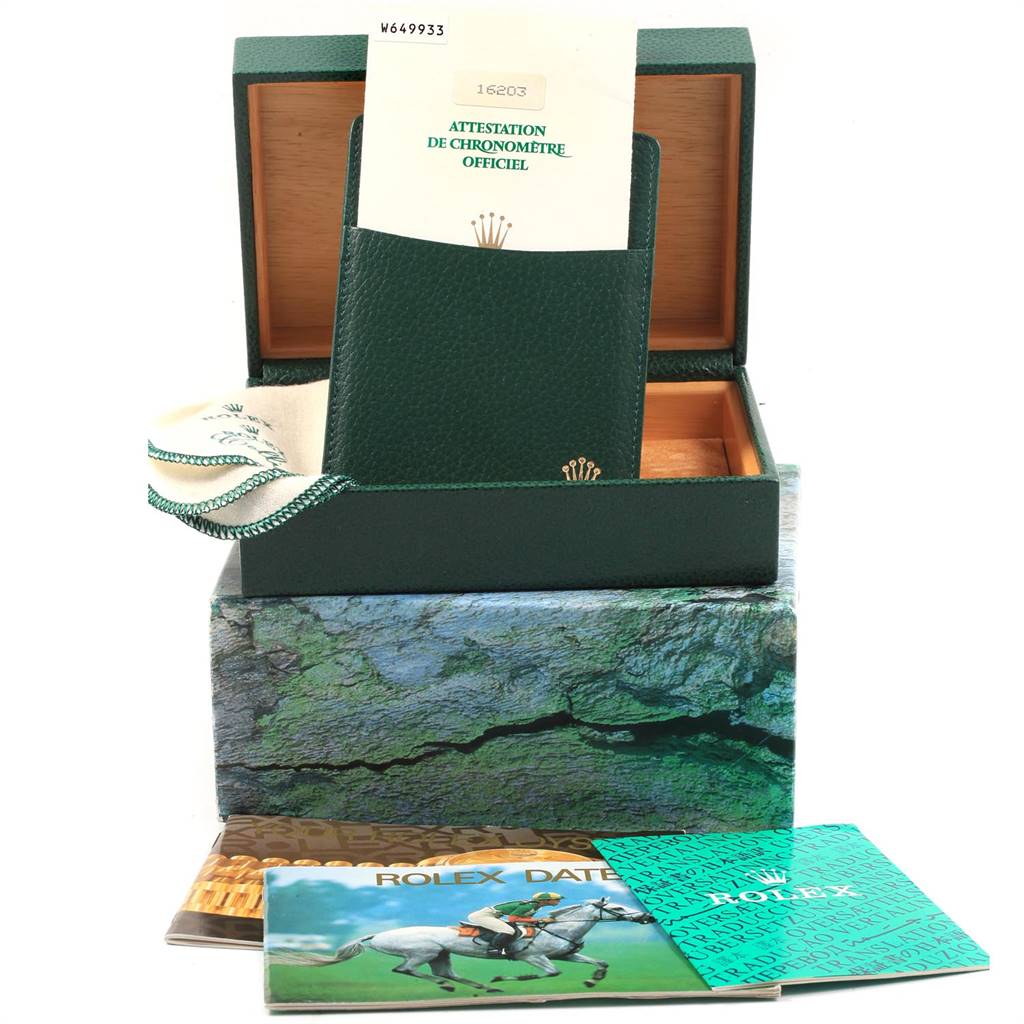 The image shows Rolex Datejust 16203 Men's Steel and Gold (two tone) Grey Dial 16203 Men's Steel and Gold (two tone) Grey Dial accessories including a certificate, box, pouch, and booklets, all displayed from a front angle.