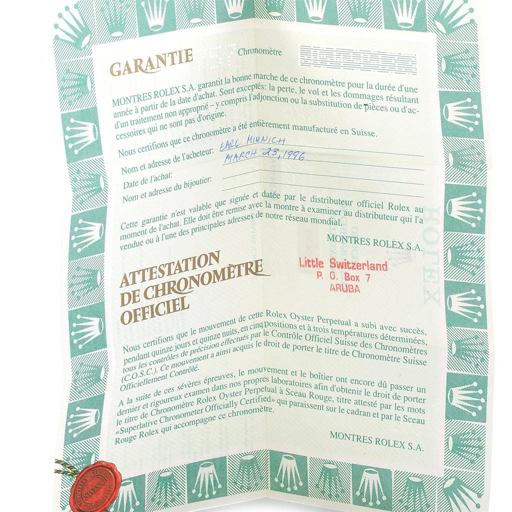 This image shows a Rolex Datejust 16203 Men's Steel and Gold (two tone) Grey Dial 16203 Men's Steel and Gold (two tone) Grey Dial warranty certificate and attestation document at an angled view.