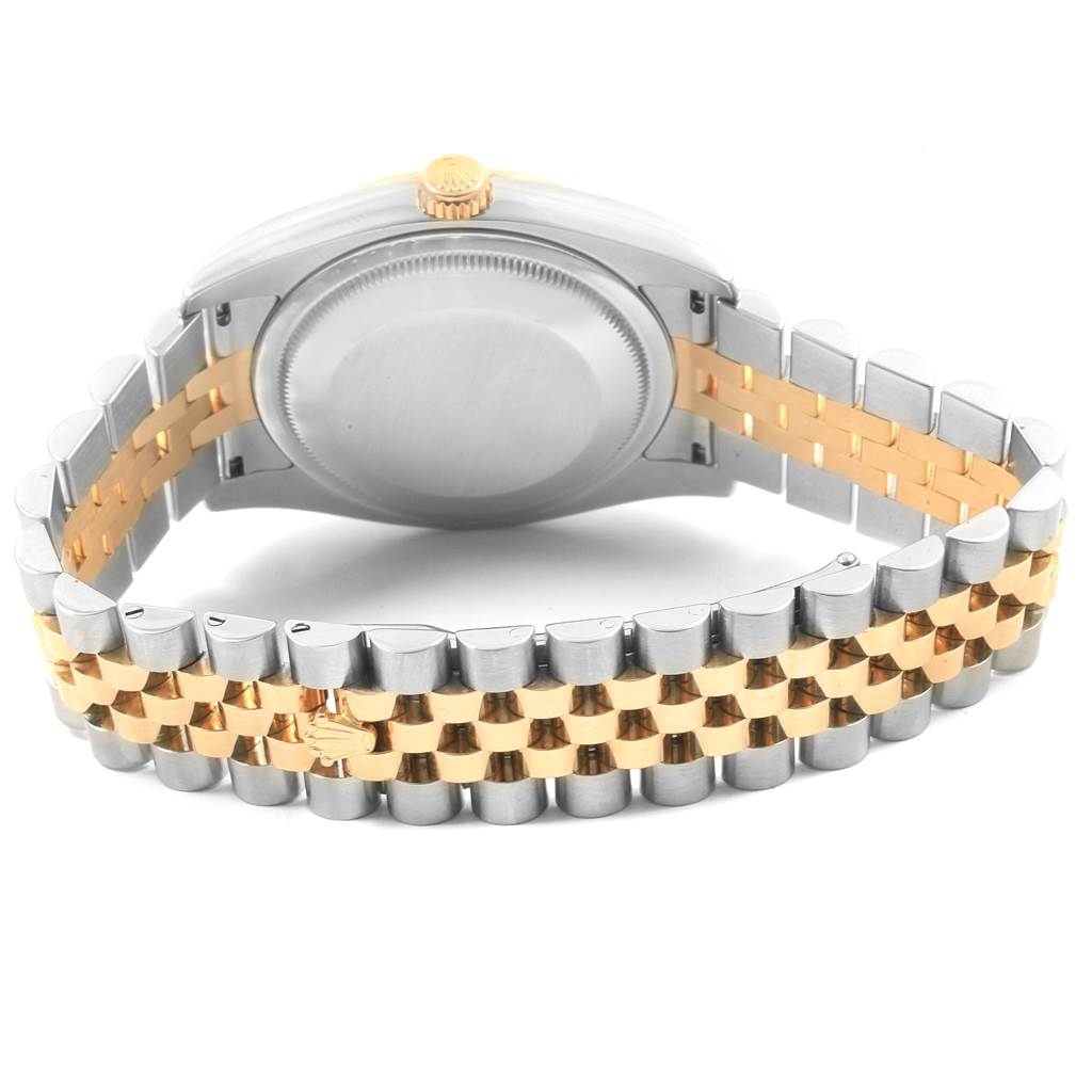 The image shows the back view of a Rolex Datejust 116233 Men's Stainless Steel White Dial 116233 Men's Stainless Steel White Dial watch, highlighting its two-tone bracelet and case back.