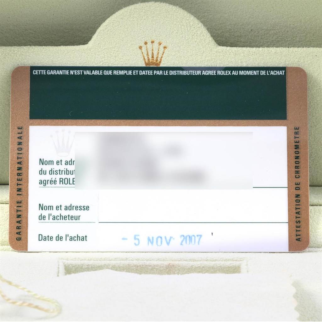 This image shows a warranty card for the Rolex Datejust 116233 Men's Stainless Steel White Dial 116233 Men's Stainless Steel White Dial model against a background with the Rolex emblem.