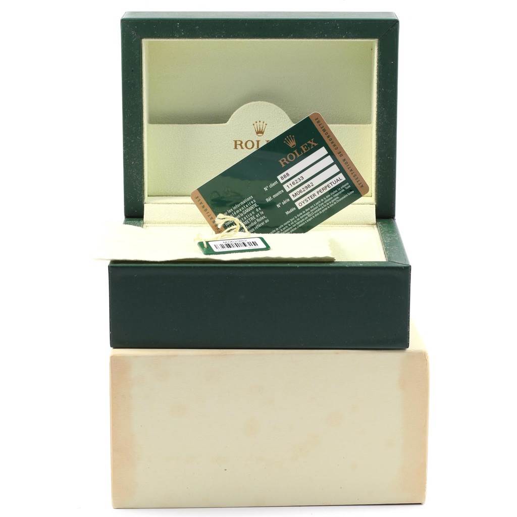 The image shows a Rolex Datejust 116233 Men's Stainless Steel White Dial 116233 Men's Stainless Steel White Dial watch box with an authenticity card placed inside the open box.