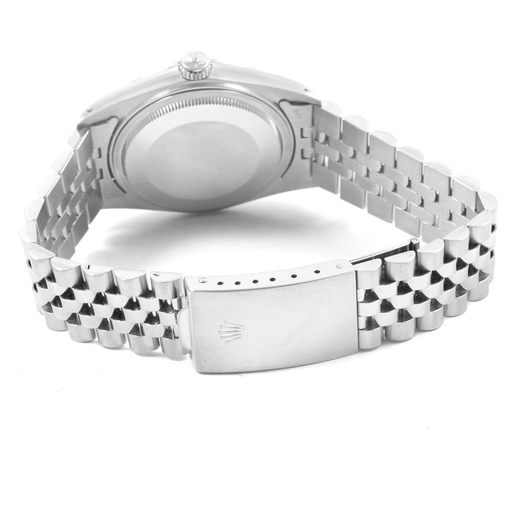 The image shows the back of the Rolex Datejust 16030 Men
s Stainless Steel Silver Dial 16030 Men
s Stainless Steel Silver Dial watch, including the case back and metal bracelet clasp.