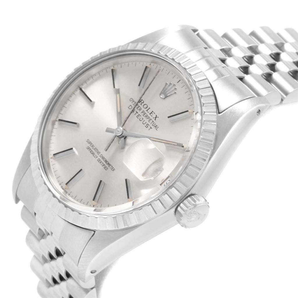 This image shows a close-up, angled view of a Rolex Datejust 16030 Men
s Stainless Steel Silver Dial 16030 Men
s Stainless Steel Silver Dial watch, displaying the face, fluted bezel, crown, and part of the bracelet.