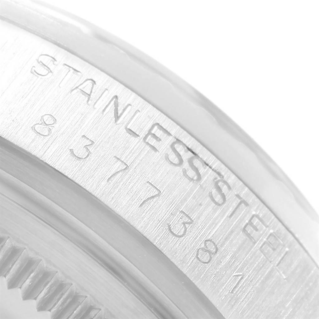 The image shows a close-up of the bezel, focusing on the engraved "Stainless Steel" marking on the Rolex Datejust 16030 Men
s Stainless Steel Silver Dial 16030 Men
s Stainless Steel Silver Dial watch.