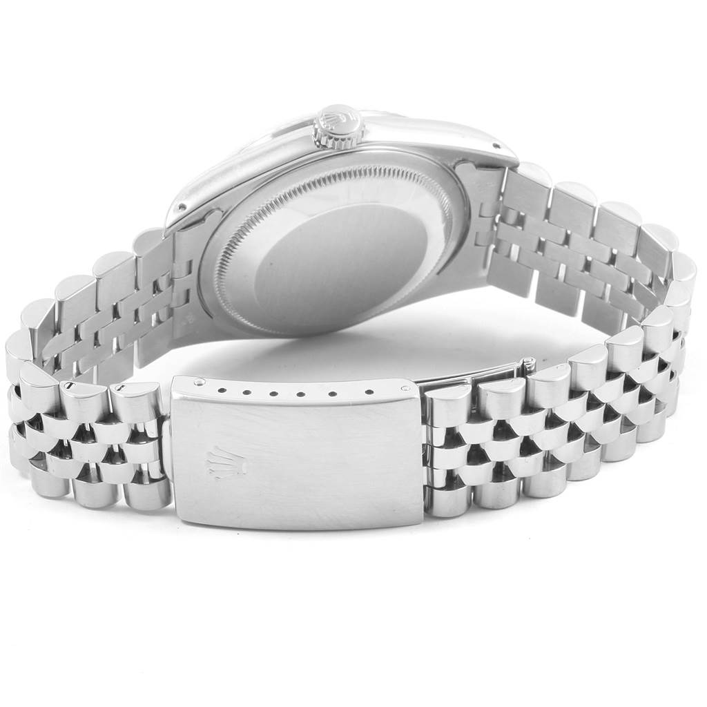 This image shows the back view of the Rolex Datejust 16234 Men's Stainless Steel White Dial 16234 Men's Stainless Steel White Dial watch case and its Jubilee bracelet with the clasp open.