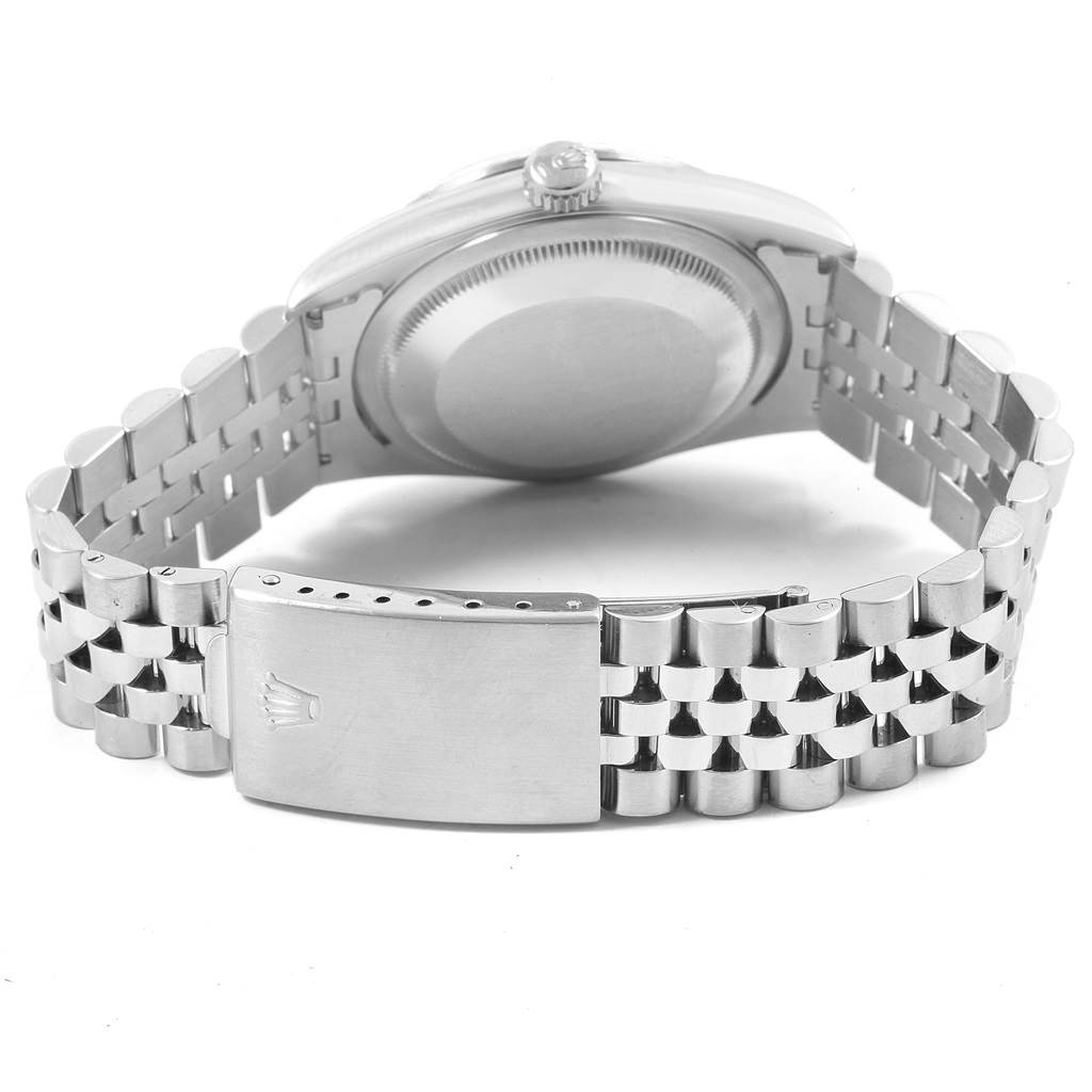 The image shows a Rolex Datejust 16234 Men's Stainless Steel White Dial 16234 Men's Stainless Steel White Dial watch from the back, highlighting its caseback, bracelet, and clasp.