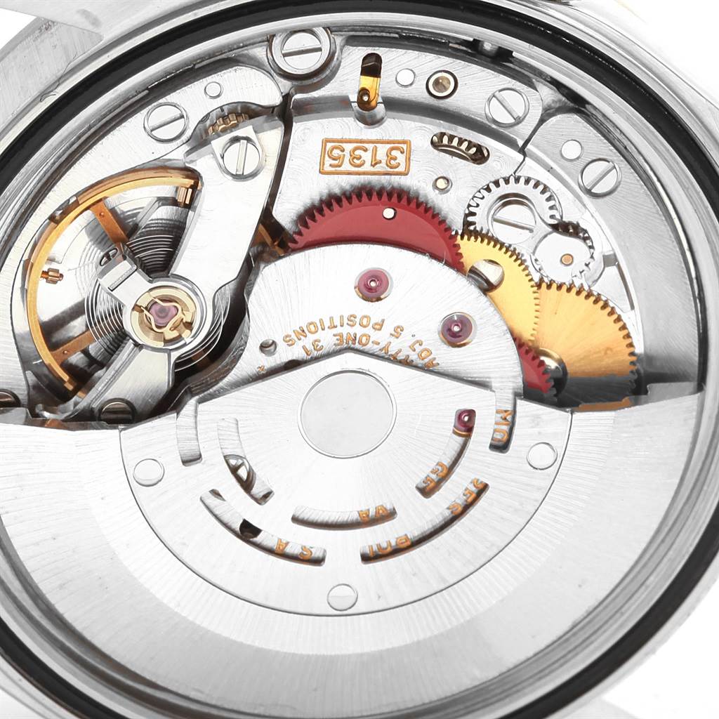 This image shows a close-up of the mechanical movement inside the Rolex Datejust 16234 Men's Stainless Steel White Dial 16234 Men's Stainless Steel White Dial model watch.