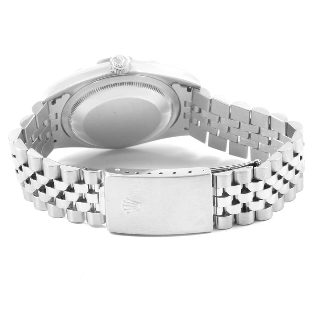 This image shows the back case and Jubilee bracelet with the clasp of a Rolex Datejust 16220 Men
s Stainless Steel Black Dial 16220 Men
s Stainless Steel Black Dial watch at a rear angle.