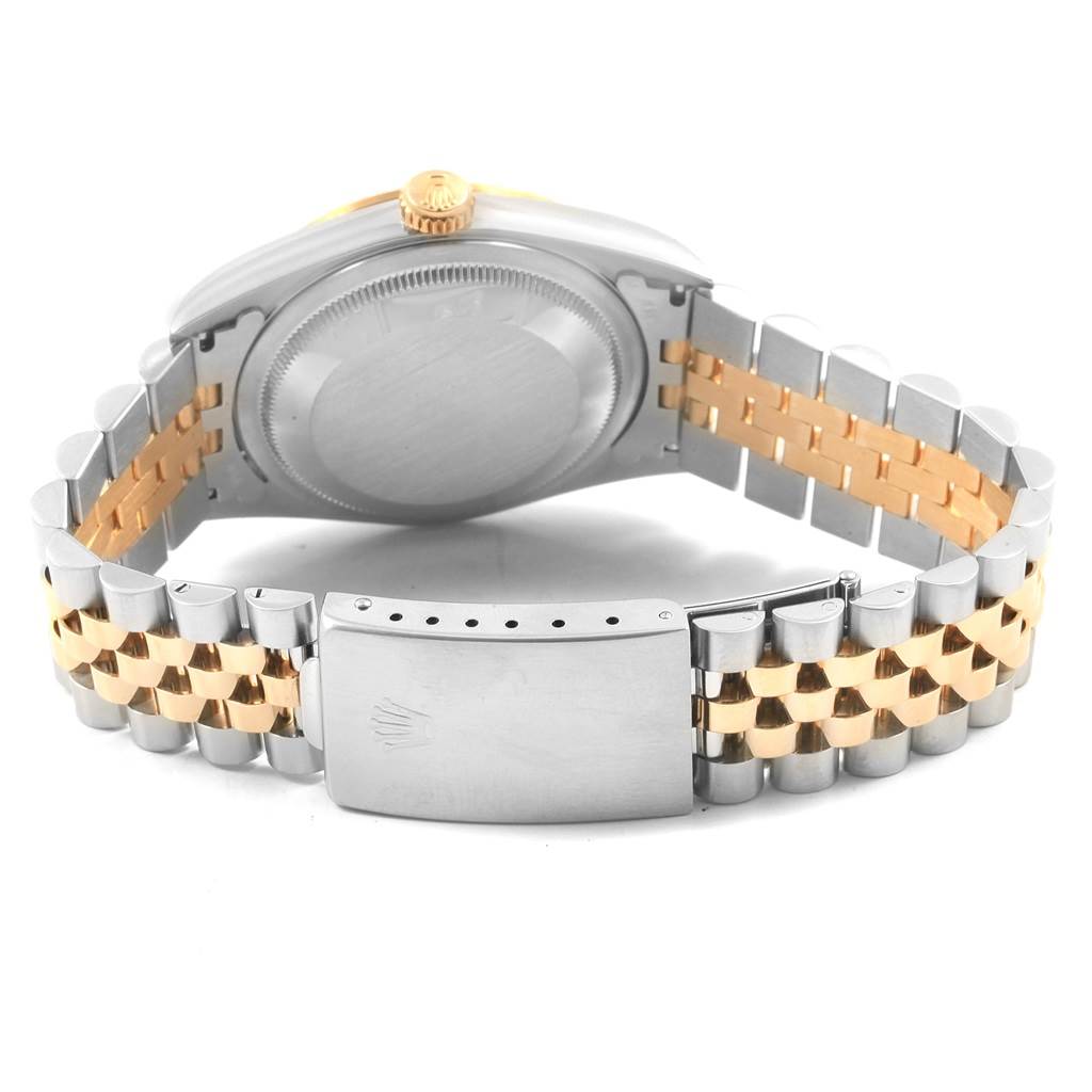 This image shows the back of a Rolex Datejust 16233 Men's Steel and Gold (two tone) Champagne Dial 16233 Men's Steel and Gold (two tone) Champagne Dial watch, highlighting the case, crown, and Jubilee bracelet with a clasp.