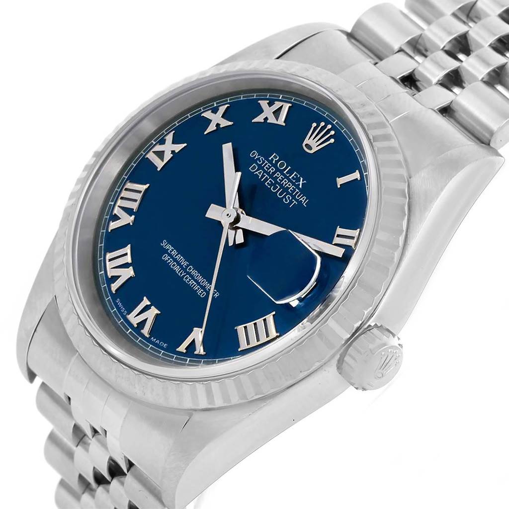 The image shows a close-up angled view of a Rolex Datejust 16234 Men's Stainless Steel Blue Dial 16234 Men's Stainless Steel Blue Dial watch, featuring its face, bezel, crown, and part of the bracelet.