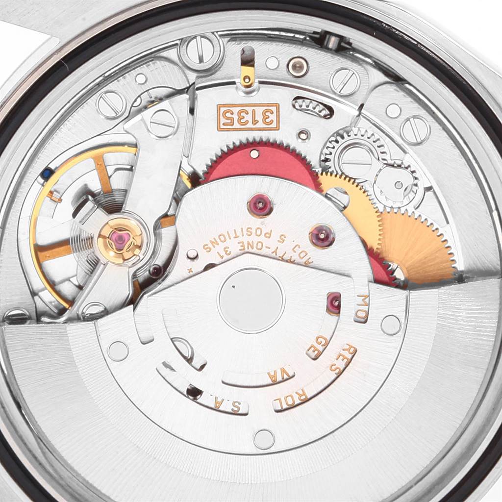 This image shows a close-up of the movement mechanism inside a Rolex Datejust 16220 Men's Stainless Steel White Dial 16220 Men's Stainless Steel White Dial watch.