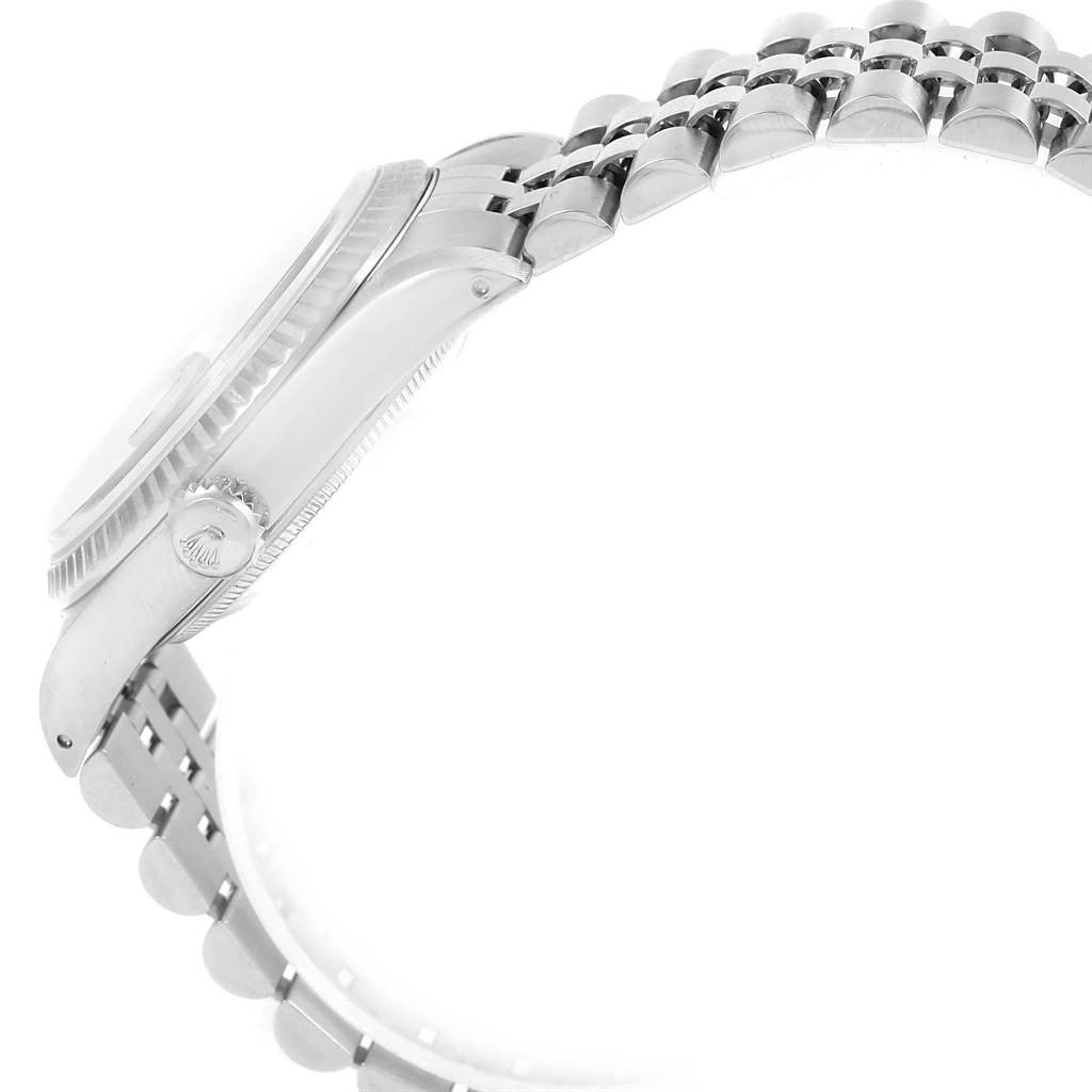 The image shows a side view of the Rolex Datejust 16234 Men's Stainless Steel Silver Dial 16234 Men's Stainless Steel Silver Dial watch, highlighting the crown and bracelet.