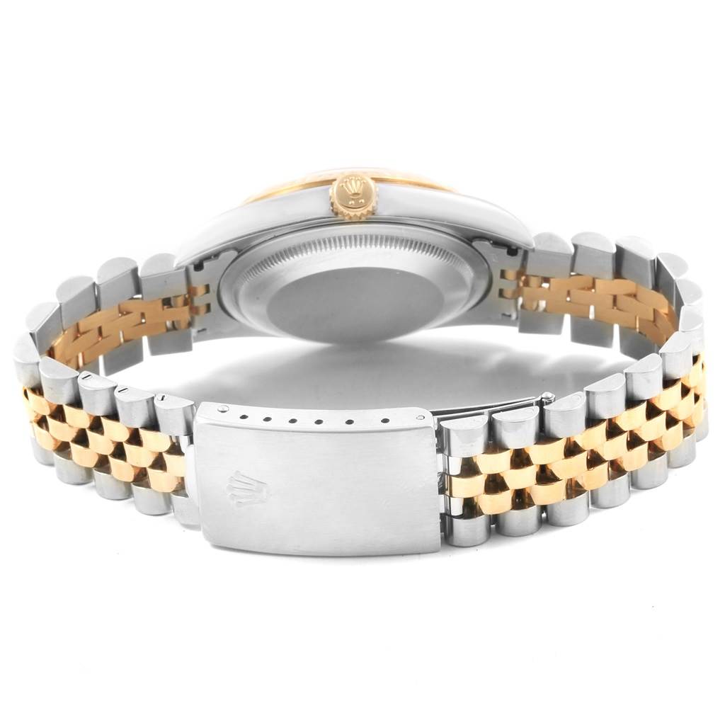 This image shows the back case and jubilee bracelet of a Rolex Datejust 16233 Men's Steel and Gold (two tone) Mother of Pearl Dial 16233 Men's Steel and Gold (two tone) Mother of Pearl Dial watch, featuring a mix of gold and silver tones.