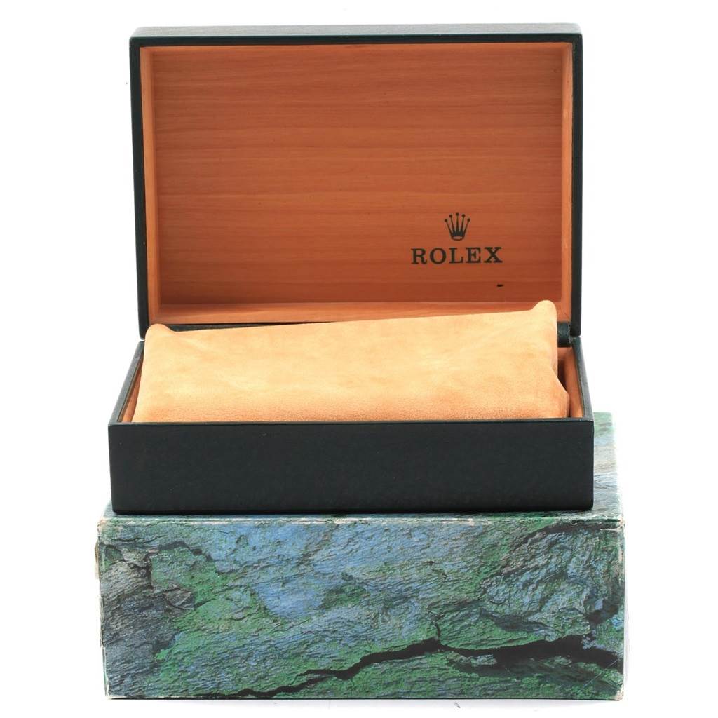 The image shows the original packaging for a Rolex Datejust 16233 Men's Steel and Gold (two tone) Mother of Pearl Dial 16233 Men's Steel and Gold (two tone) Mother of Pearl Dial watch, including an open box with a pillow inside.