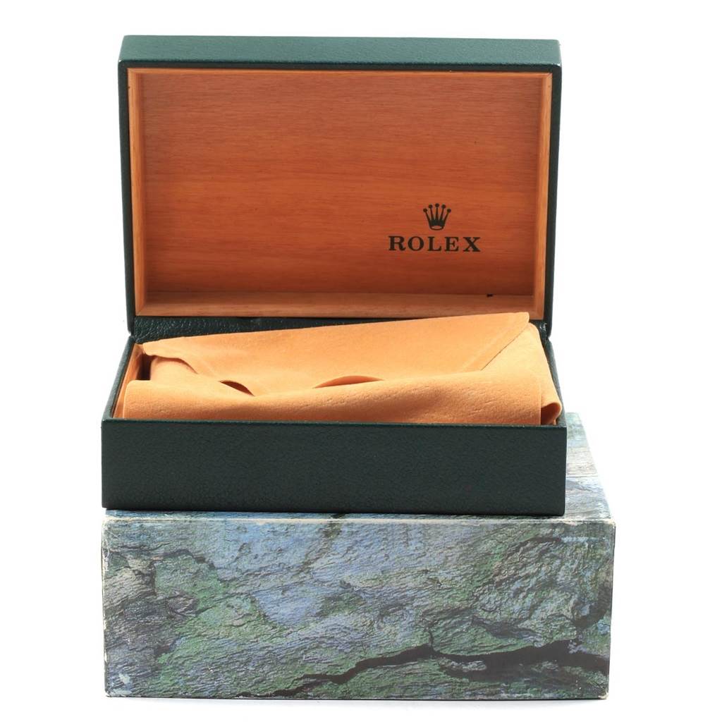 The image shows a Rolex Datejust 16234 Men's Stainless Steel Blue Dial 16234 Men's Stainless Steel Blue Dial watch box, partially open, with a cloth inside.