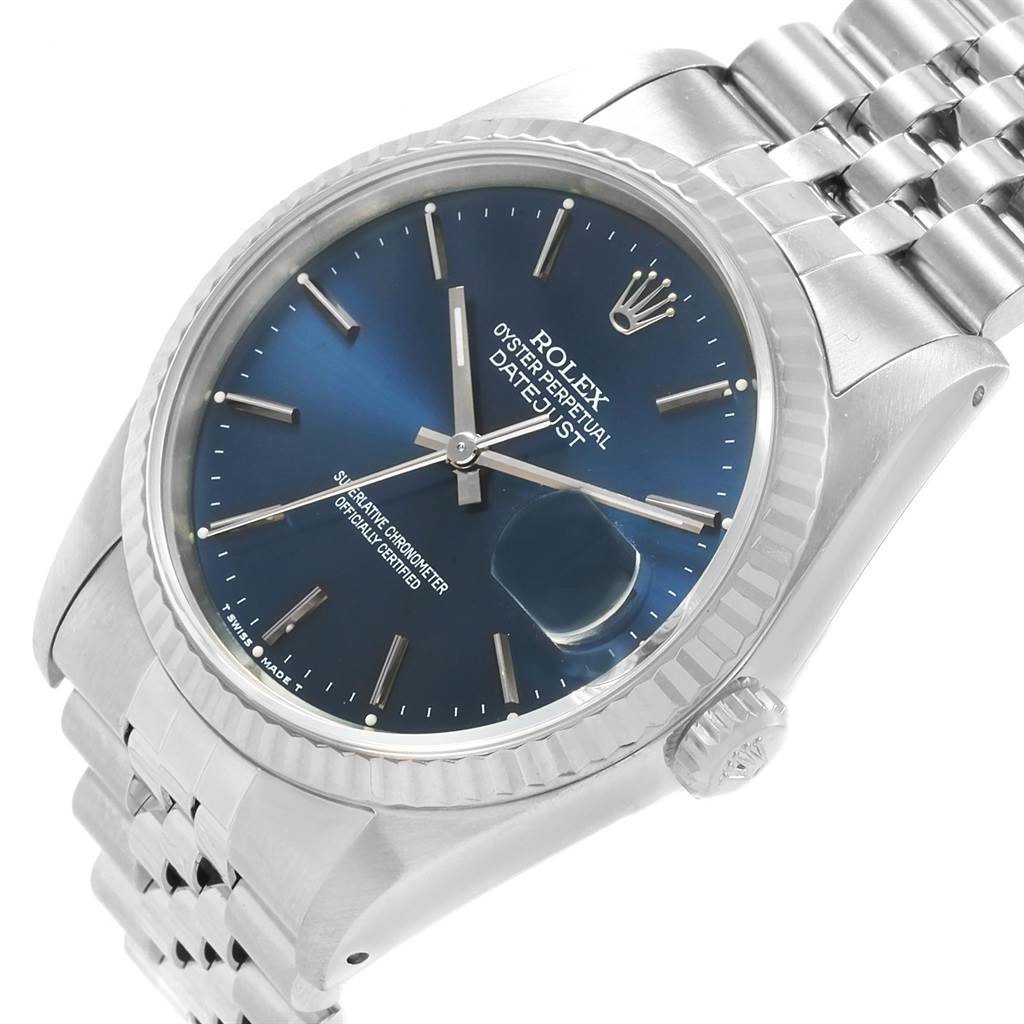 This image shows a Rolex Datejust 16234 Men's Stainless Steel Blue Dial 16234 Men's Stainless Steel Blue Dial watch at an angled view highlighting the dial, bezel, crown, and part of the bracelet.