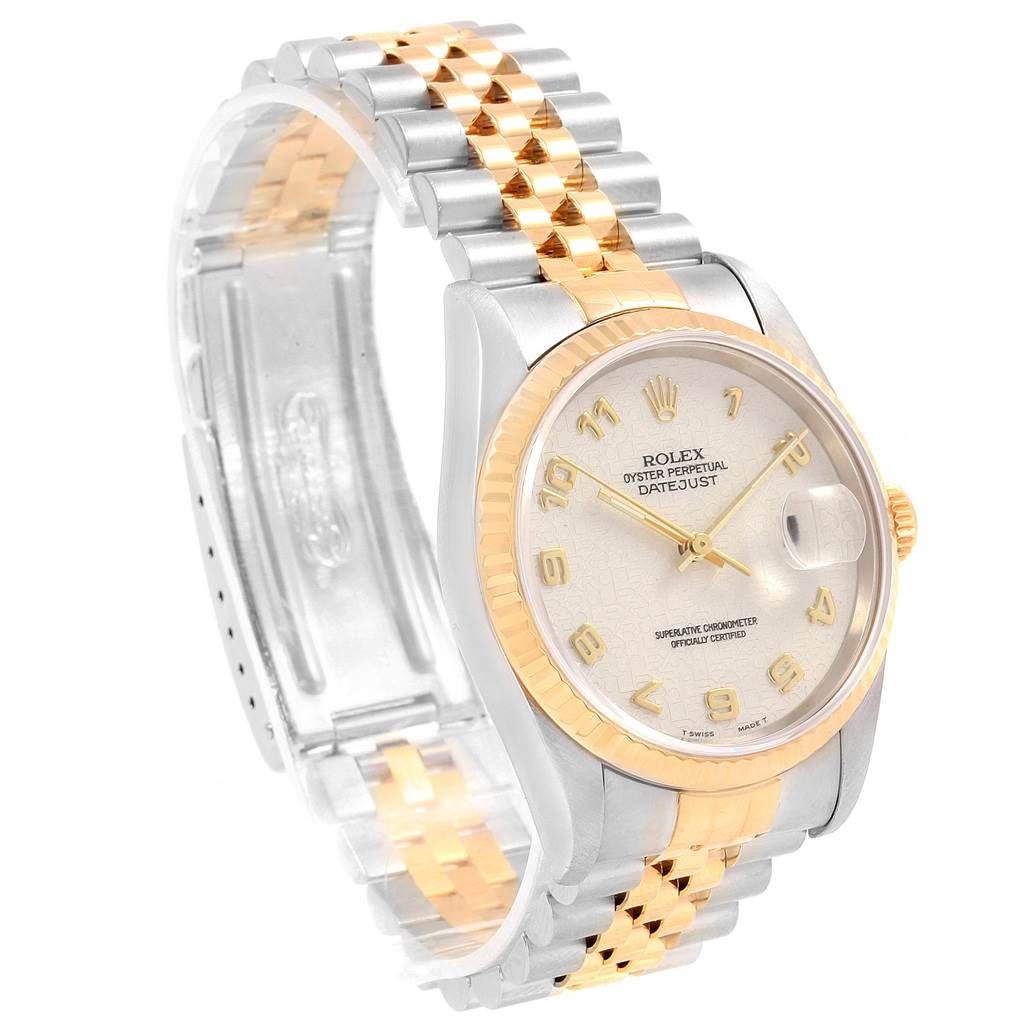 The Rolex Datejust 16233 Men's Steel and Gold (two tone) Beige Dial 16233 Men's Steel and Gold (two tone) Beige Dial watch is shown at a slight angle, displaying its face, fluted bezel, crown, and Jubilee bracelet.