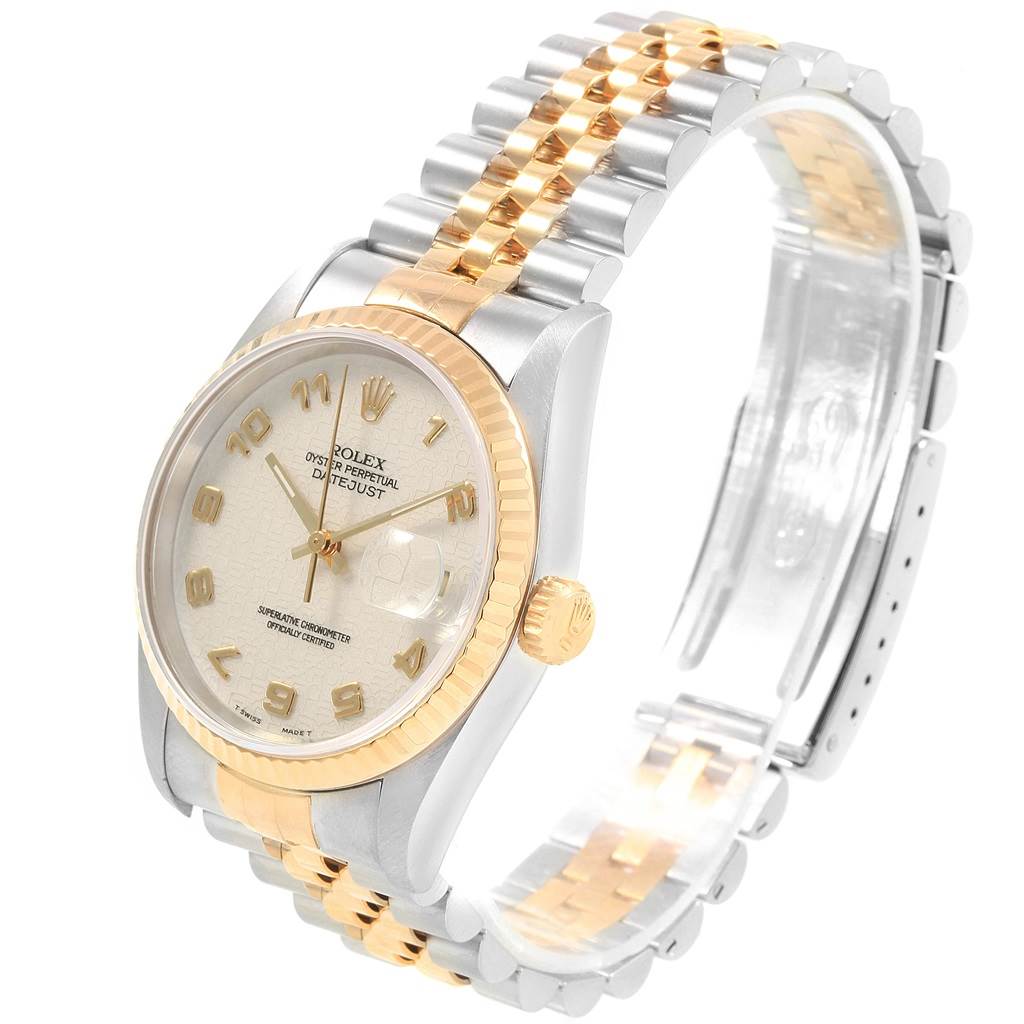 The image shows a Rolex Datejust 16233 Men's Steel and Gold (two tone) Beige Dial 16233 Men's Steel and Gold (two tone) Beige Dial watch from an angled side view, illustrating the face, casing, and two-tone bracelet.