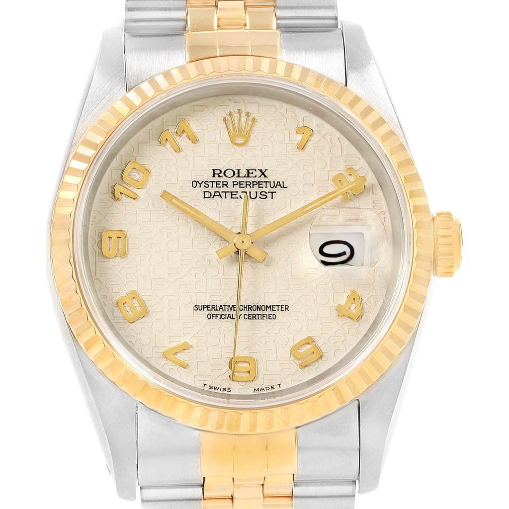 The image shows a frontal view of the Rolex Datejust 16233 Men's Steel and Gold (two tone) Beige Dial 16233 Men's Steel and Gold (two tone) Beige Dial watch, highlighting the dial, fluted bezel, and part of the bracelet.
