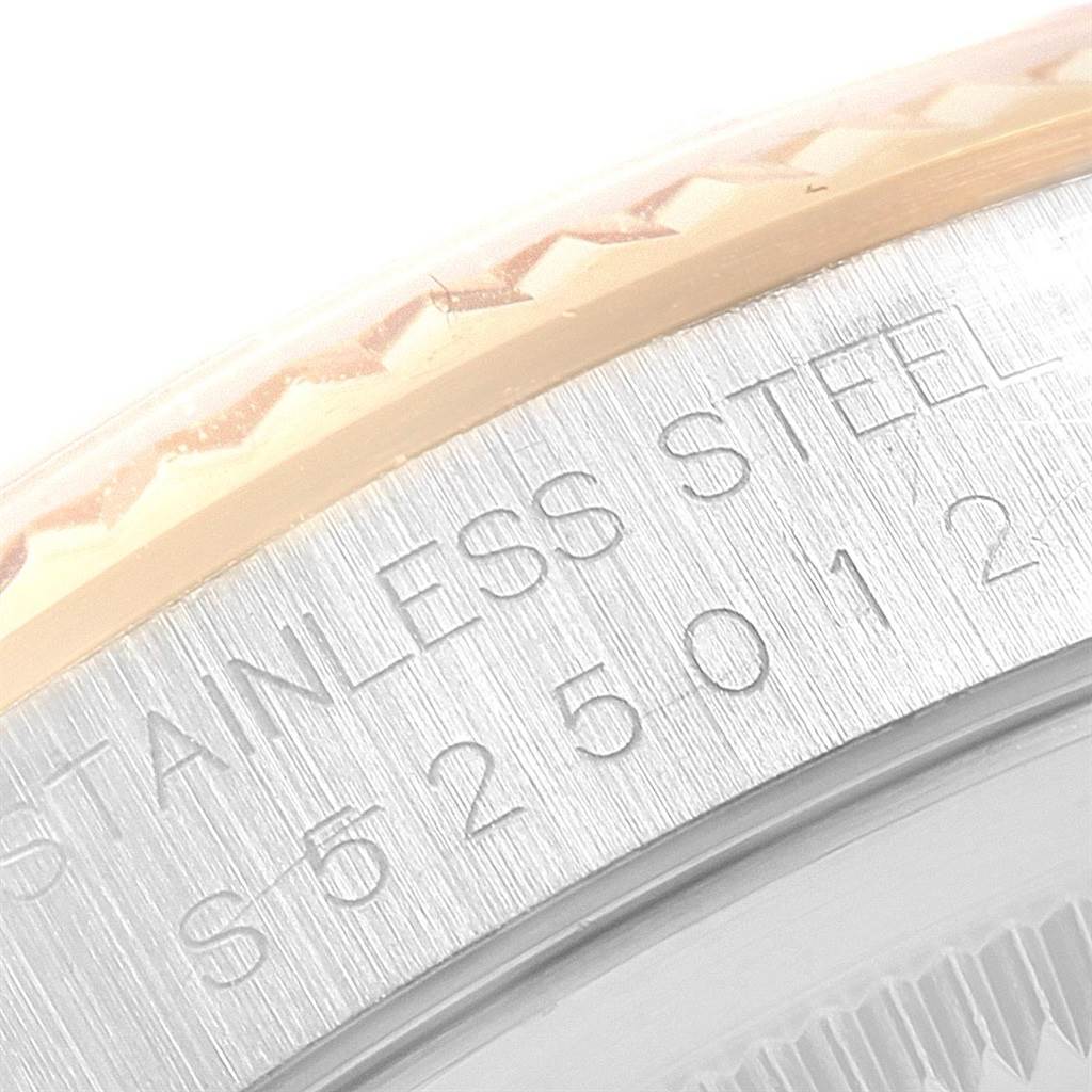 This image shows a close-up of the bezel and part of the caseback of a Rolex Datejust 16233 Men's Steel and Gold (two tone) Beige Dial 16233 Men's Steel and Gold (two tone) Beige Dial watch, highlighting the "STAINLESS STEEL" engraving.