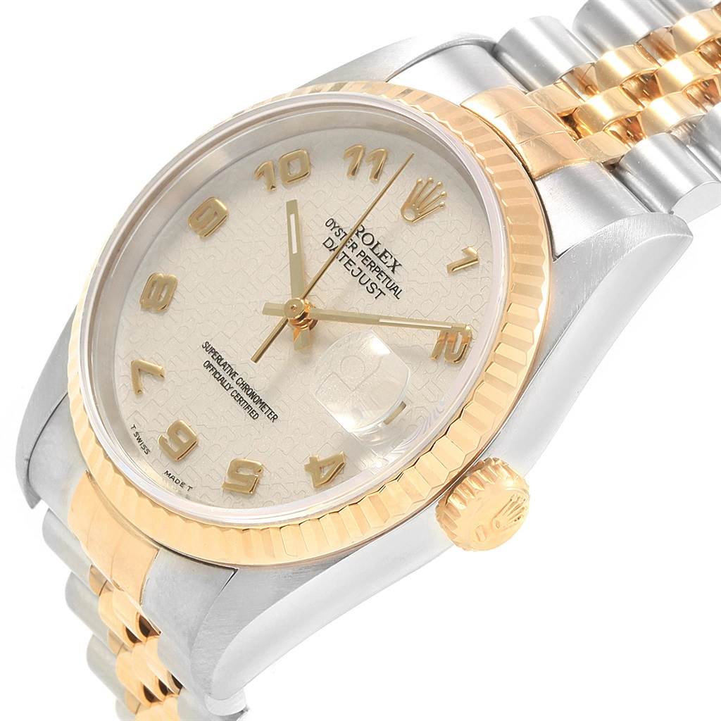 This image shows a close-up angled view of a Rolex Datejust 16233 Men's Steel and Gold (two tone) Beige Dial 16233 Men's Steel and Gold (two tone) Beige Dial watch, highlighting the dial, bezel, and part of the bracelet.