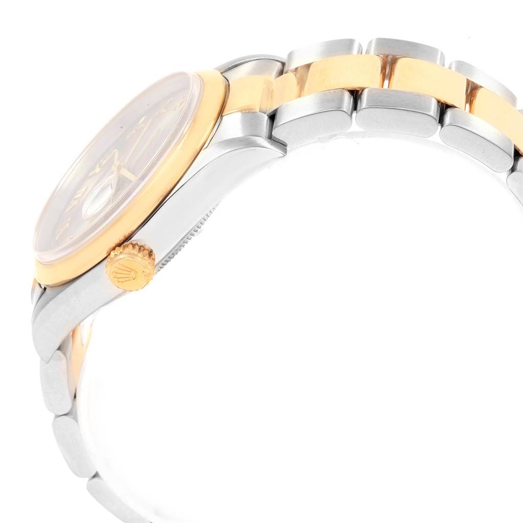 The image shows a side view of the Rolex Datejust 16203 Men's Steel and Gold (two tone) Grey Dial 16203 Men's Steel and Gold (two tone) Grey Dial watch, highlighting its gold bezel, crown, and two-tone bracelet.