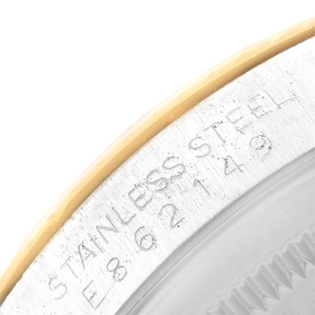 The image shows a close-up of the stainless steel case back of a Rolex Datejust 16233 Men's Steel and Gold (two tone) Champagne Dial 16233 Men's Steel and Gold (two tone) Champagne Dial watch, including part of the serial number.