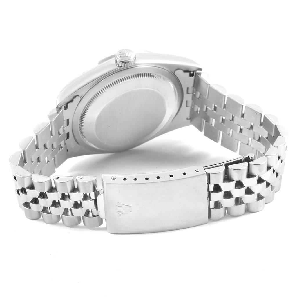 This image shows the back view of a Rolex Datejust 16220 Men's Stainless Steel Pink Dial 16220 Men's Stainless Steel Pink Dial watch, highlighting the clasp and bracelet.