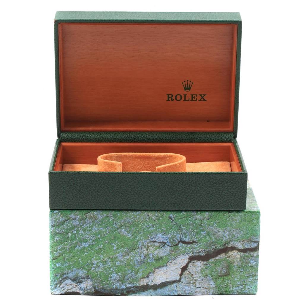 The image shows an open Rolex Datejust 16220 Men's Stainless Steel Pink Dial 16220 Men's Stainless Steel Pink Dial watch box with an inner cushion, featuring the brand's logo.