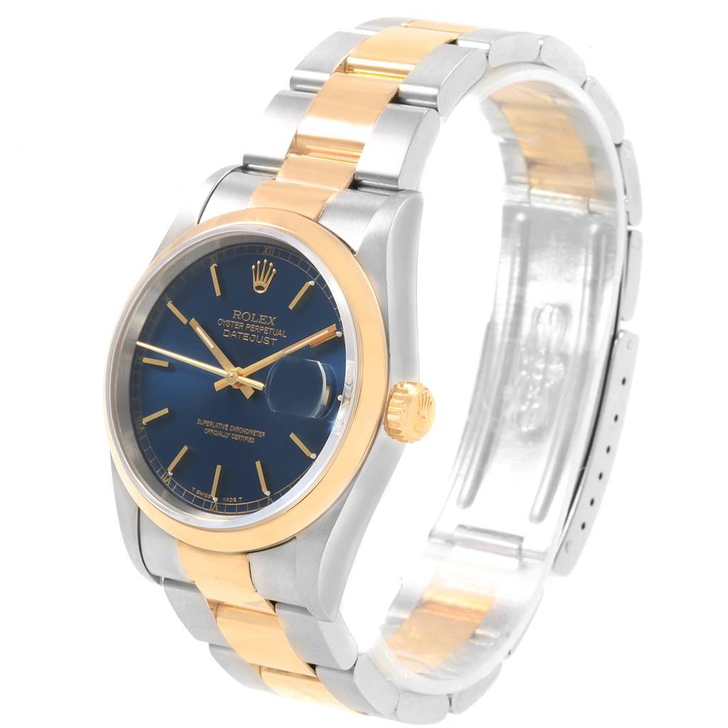 This image shows a Rolex Datejust 16203 Men
s Steel and Gold (two tone) Blue Dial 16203 Men
s Steel and Gold (two tone) Blue Dial watch at a three-quarter angle highlighting its face, bracelet, bezel, and crown.