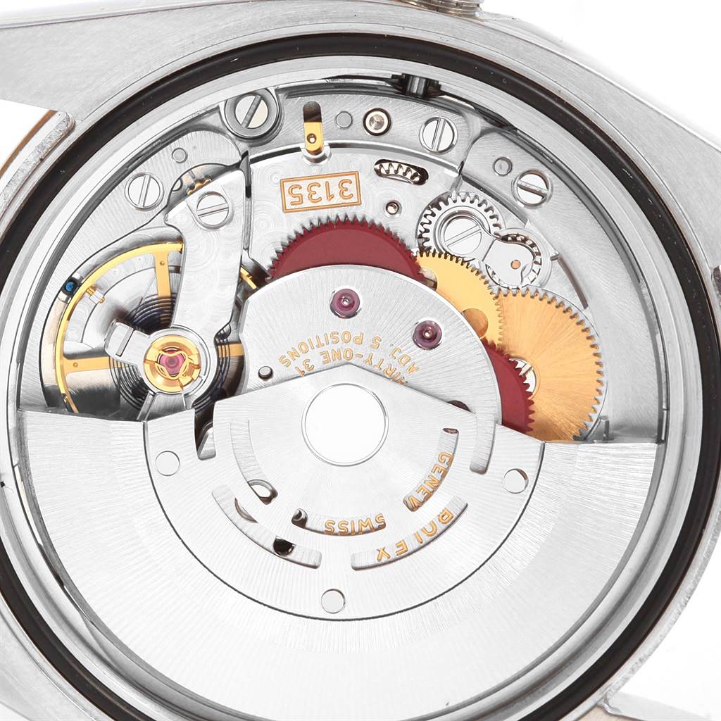 This is a close-up view of the inner mechanical movement of the Rolex Datejust 116233 Men's Stainless Steel Silver Dial 116233 Men's Stainless Steel Silver Dial watch.
