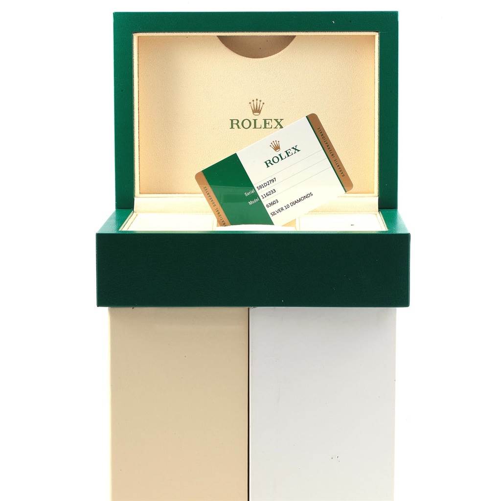 The image shows a Rolex Datejust 116233 Men's Stainless Steel Silver Dial 116233 Men's Stainless Steel Silver Dial box, open, displaying a warranty card standing inside.