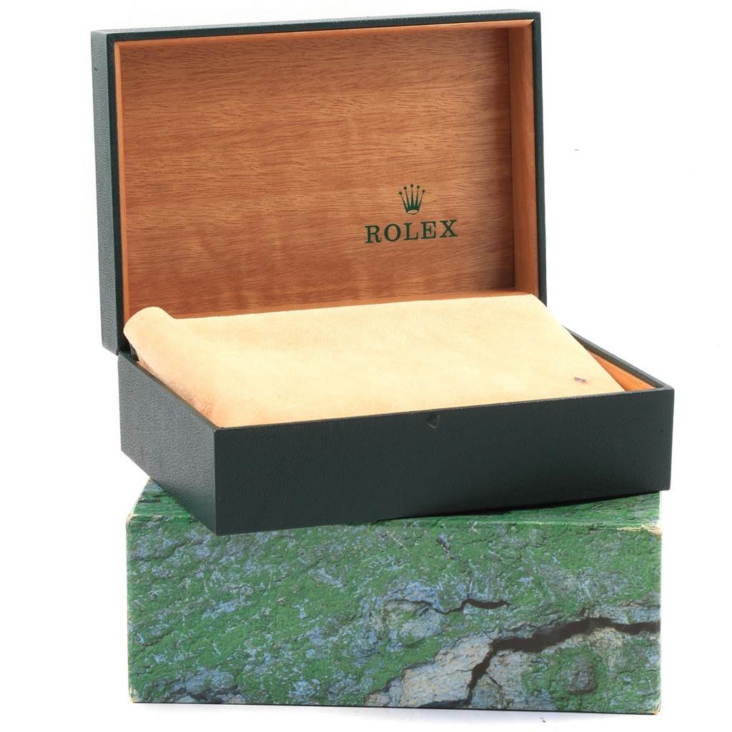 The image shows an open box for a Rolex Datejust 16233 Men's Steel and Gold (two tone) Champagne Dial 16233 Men's Steel and Gold (two tone) Champagne Dial watch, highlighting the interior with the Rolex logo.