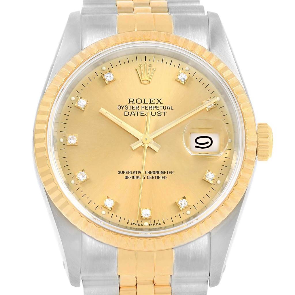 This image shows a Rolex Datejust 16233 Men's Steel and Gold (two tone) Champagne Dial 16233 Men's Steel and Gold (two tone) Champagne Dial watch viewed from the top, highlighting its champagne dial, diamond hour markers, and two-tone bracelet.