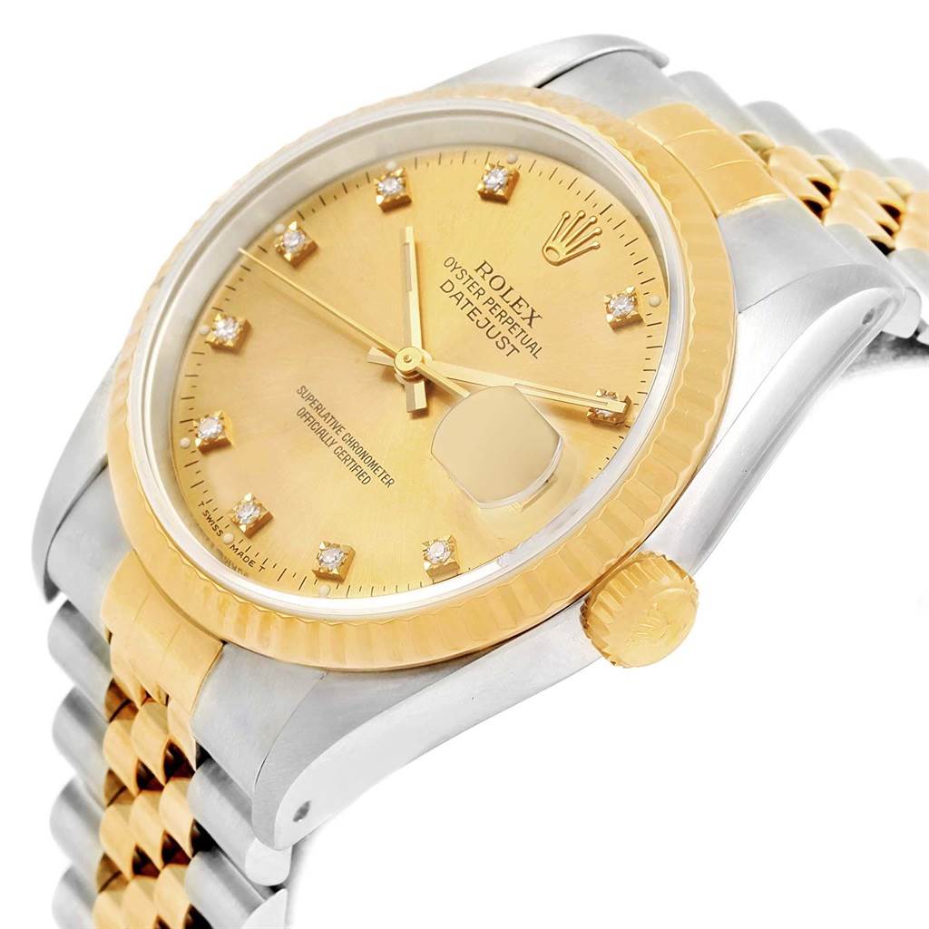 The image shows a Rolex Datejust 16233 Men's Steel and Gold (two tone) Champagne Dial 16233 Men's Steel and Gold (two tone) Champagne Dial model watch at an angled close-up, focusing on its face, crown, and partial bracelet.