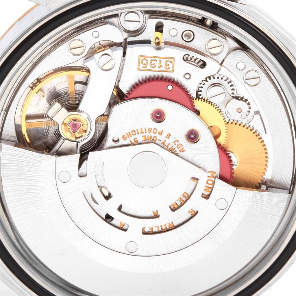 The image shows a close-up view of the movement mechanism inside a Rolex Datejust 16233 Men's Steel and Gold (two tone) Champagne Dial 16233 Men's Steel and Gold (two tone) Champagne Dial watch.