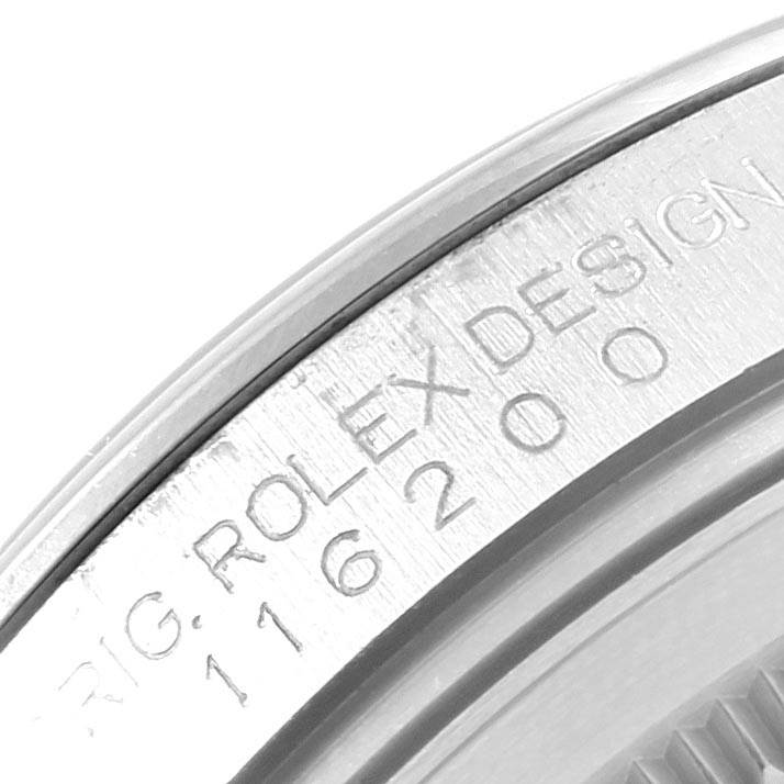 This image shows a close-up of the serial number and engraving on the case side of a Rolex Datejust 116200 Men
s Stainless Steel Black Dial 116200 Men
s Stainless Steel Black Dial watch.