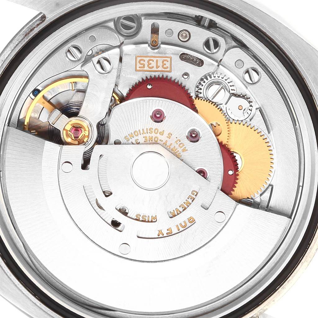 This image shows the internal mechanical movement of a Rolex Datejust 116200 Men
s Stainless Steel Black Dial 116200 Men
s Stainless Steel Black Dial watch, viewed from the back.