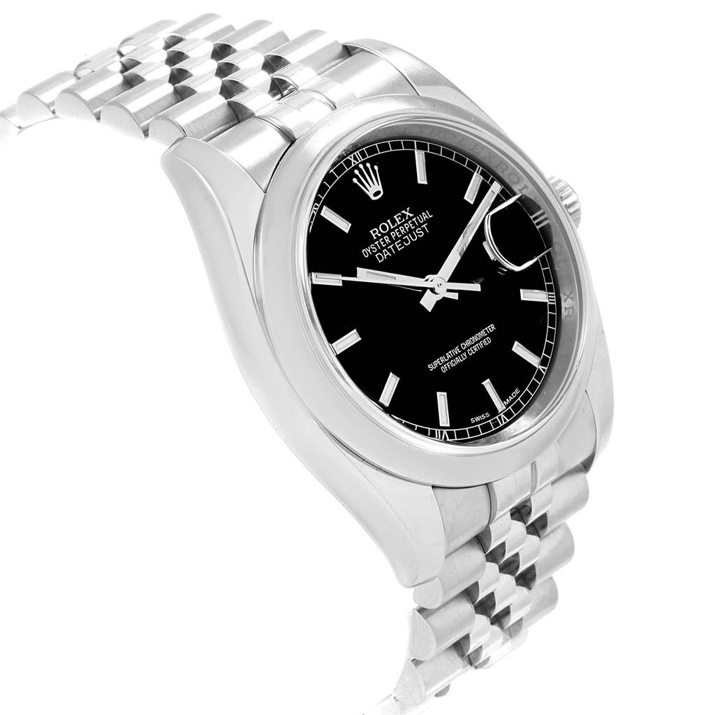 The image shows a side angle of a Rolex Datejust 116200 Men
s Stainless Steel Black Dial 116200 Men
s Stainless Steel Black Dial watch with a black dial, date window, and part of the metal bracelet.
