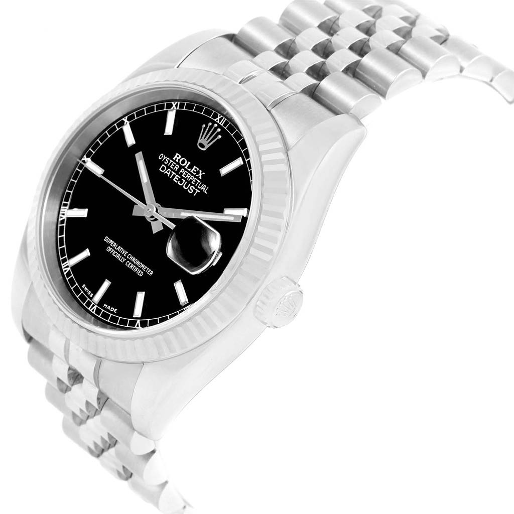 The image shows a Rolex Datejust 116234 Men
s Stainless Steel Black Dial 116234 Men
s Stainless Steel Black Dial model watch at a tilted angle, highlighting the black dial, fluted bezel, and part of the jubilee bracelet.