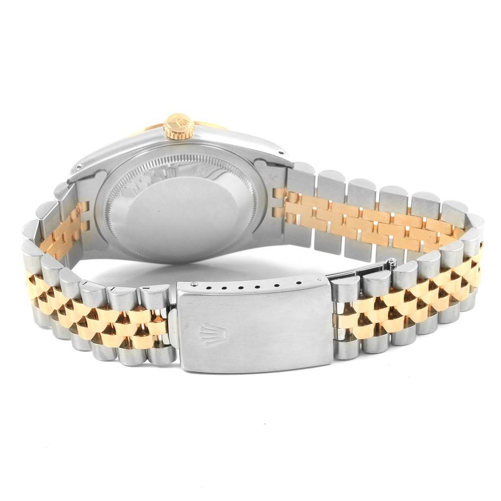 The image shows the back case and the bracelet of a Rolex Datejust 16233 Men's Steel and Gold (two tone) Champagne Dial 16233 Men's Steel and Gold (two tone) Champagne Dial watch from a rear angle.