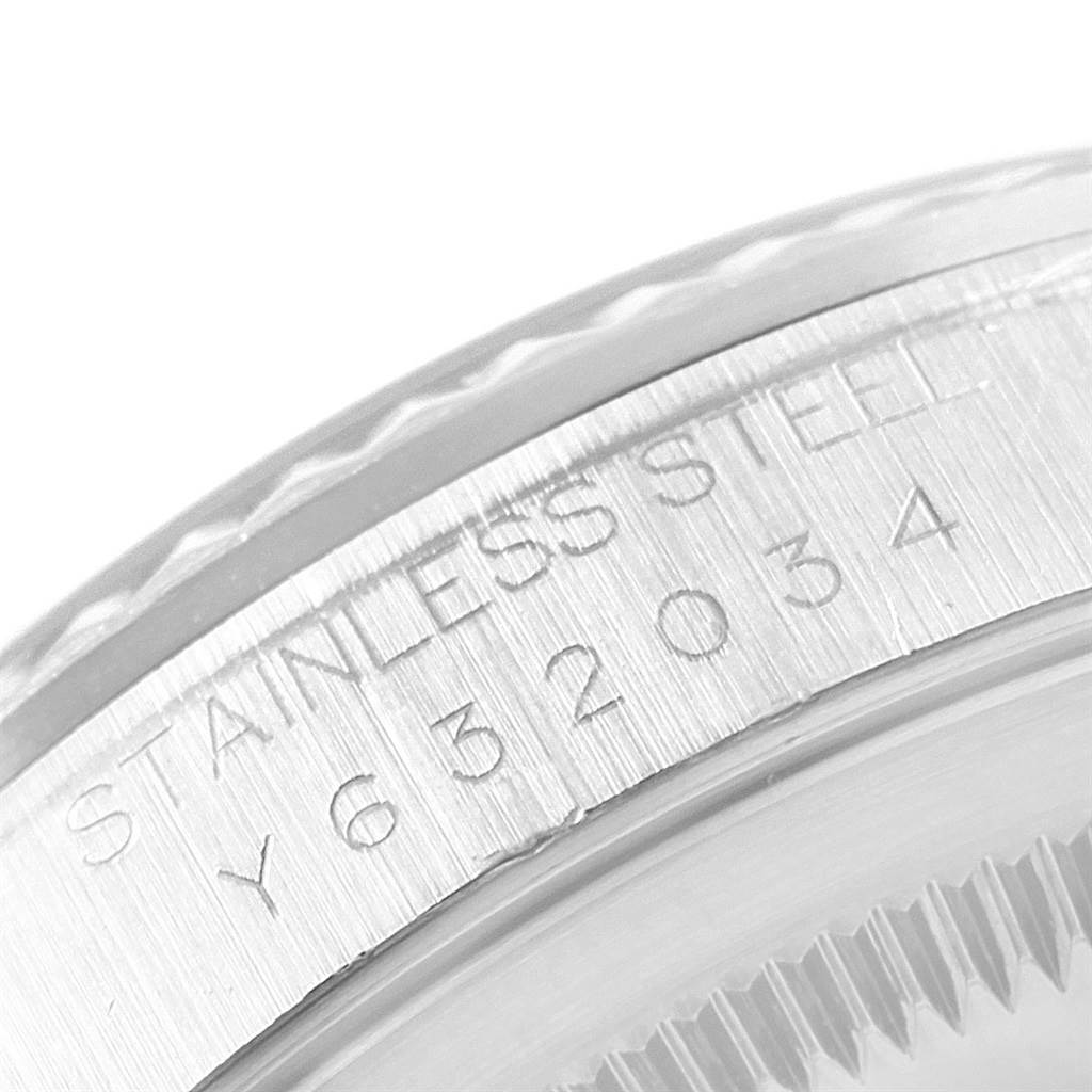 This image shows a close-up of the case engraving on a stainless steel Rolex Datejust 16234 Men
s Stainless Steel Silver Dial 16234 Men
s Stainless Steel Silver Dial watch.