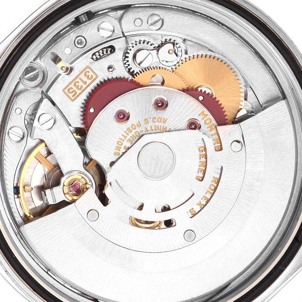 This image shows a close-up of the movement mechanism of a Rolex Datejust 16234 Men
s Stainless Steel Silver Dial 16234 Men
s Stainless Steel Silver Dial watch.