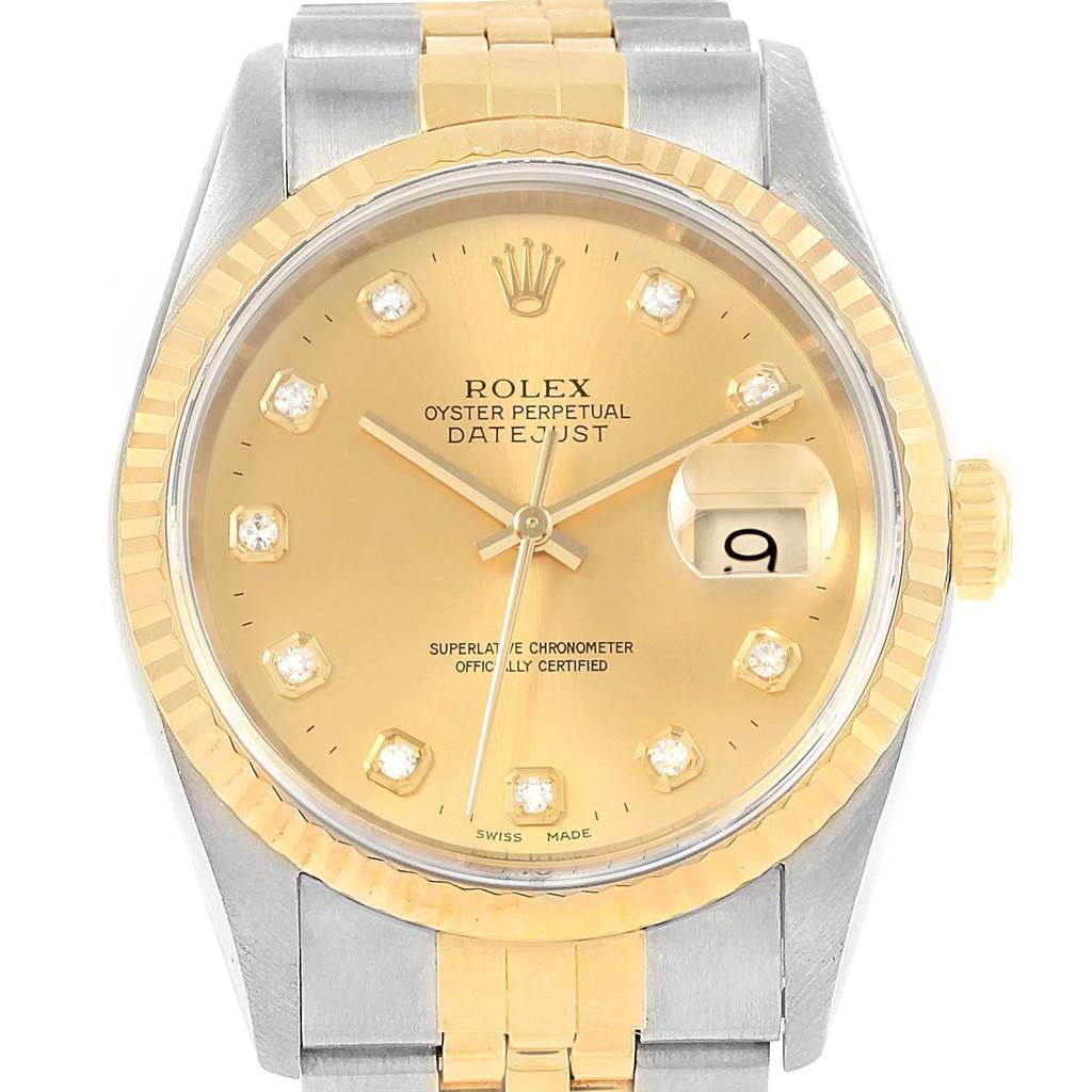 This Rolex Datejust 16233 Men's Steel and Gold (two tone) Champagne Dial 16233 Men's Steel and Gold (two tone) Champagne Dial watch is shown from the front, highlighting its gold dial, diamond hour markers, date window, and two-tone bracelet.