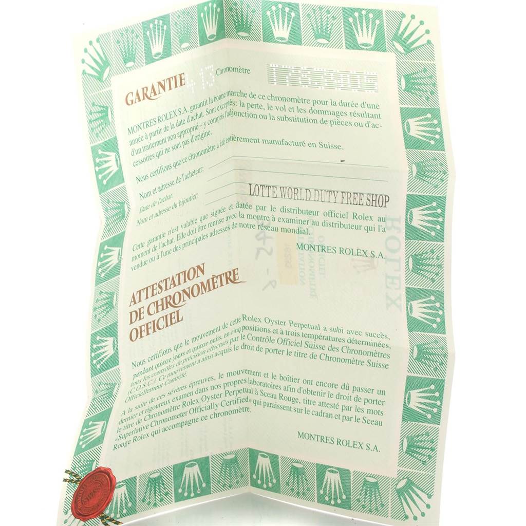 This image shows the warranty and chronometer certification document for a Rolex Datejust 16233 Men's Steel and Gold (two tone) Champagne Dial 16233 Men's Steel and Gold (two tone) Champagne Dial model.