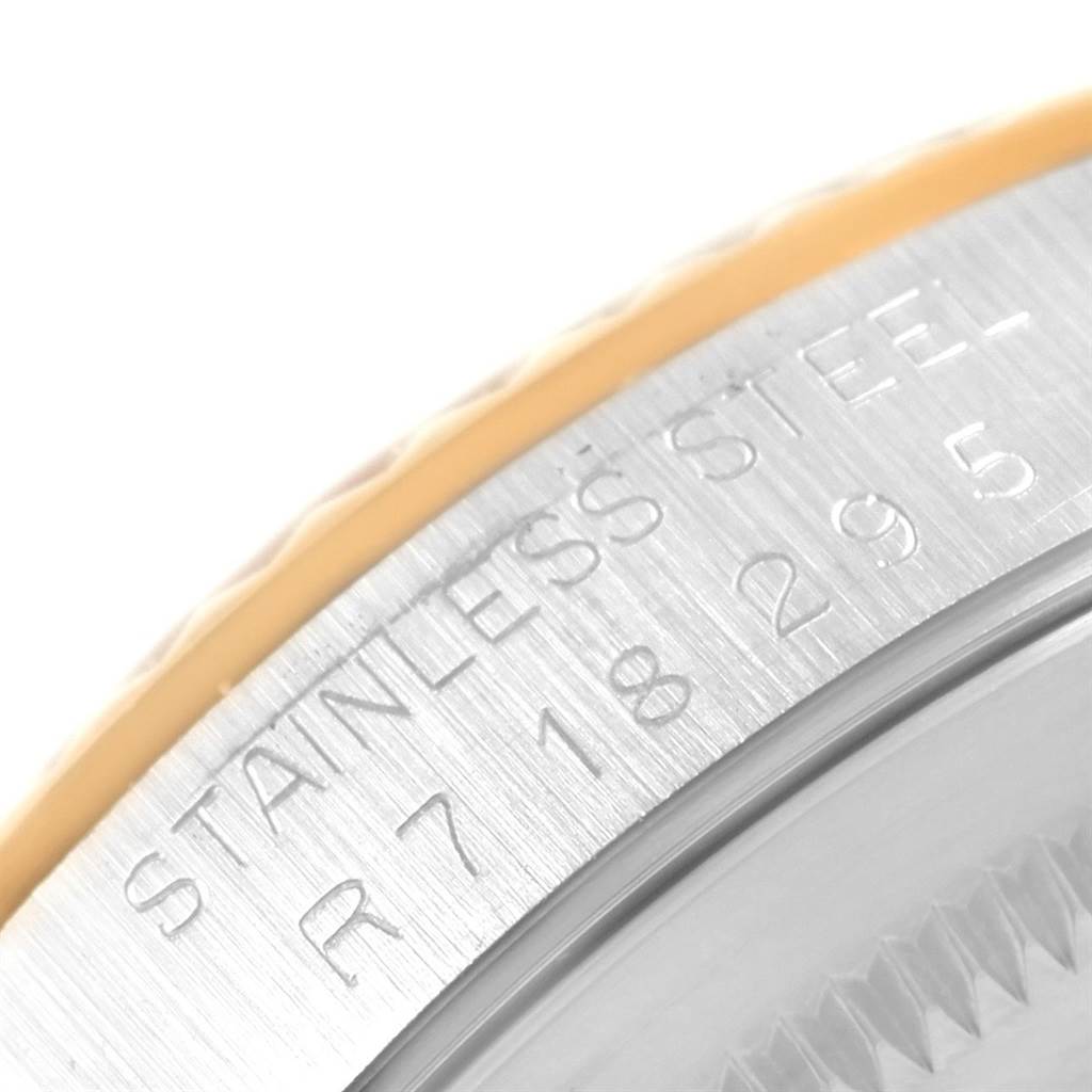 The image shows a close-up of the stainless steel case back with the engraved details of a Rolex Datejust 16233 Men's Steel and Gold (two tone) Champagne Dial 16233 Men's Steel and Gold (two tone) Champagne Dial watch.