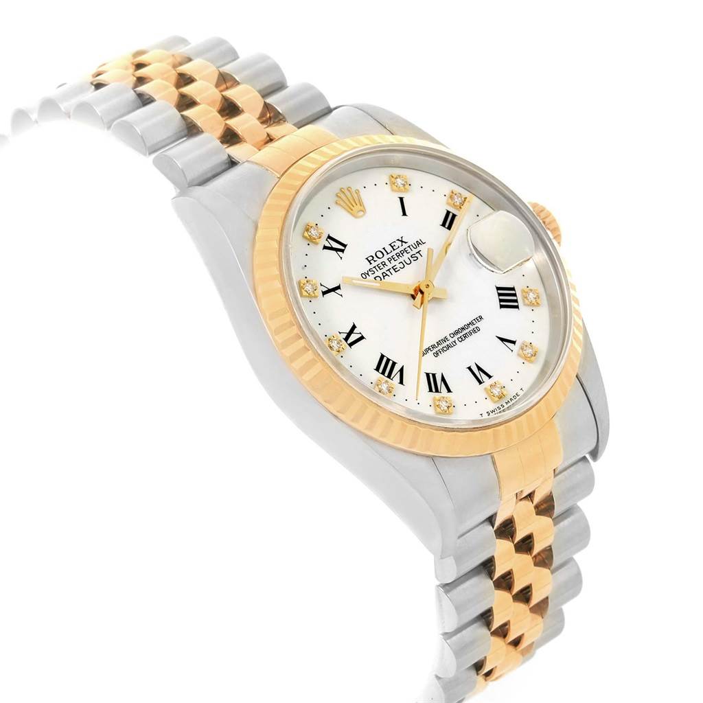 The Rolex Datejust 16233 Men's Steel and Gold (two tone) White Dial 16233 Men's Steel and Gold (two tone) White Dial watch is shown at an angle highlighting the face, bezel, and two-tone jubilee bracelet.