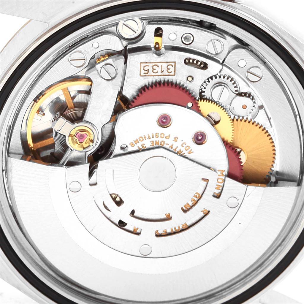 The image shows the internal mechanics and movement parts of a Rolex Datejust 16233 Men's Steel and Gold (two tone) White Dial 16233 Men's Steel and Gold (two tone) White Dial watch from a close-up angle.