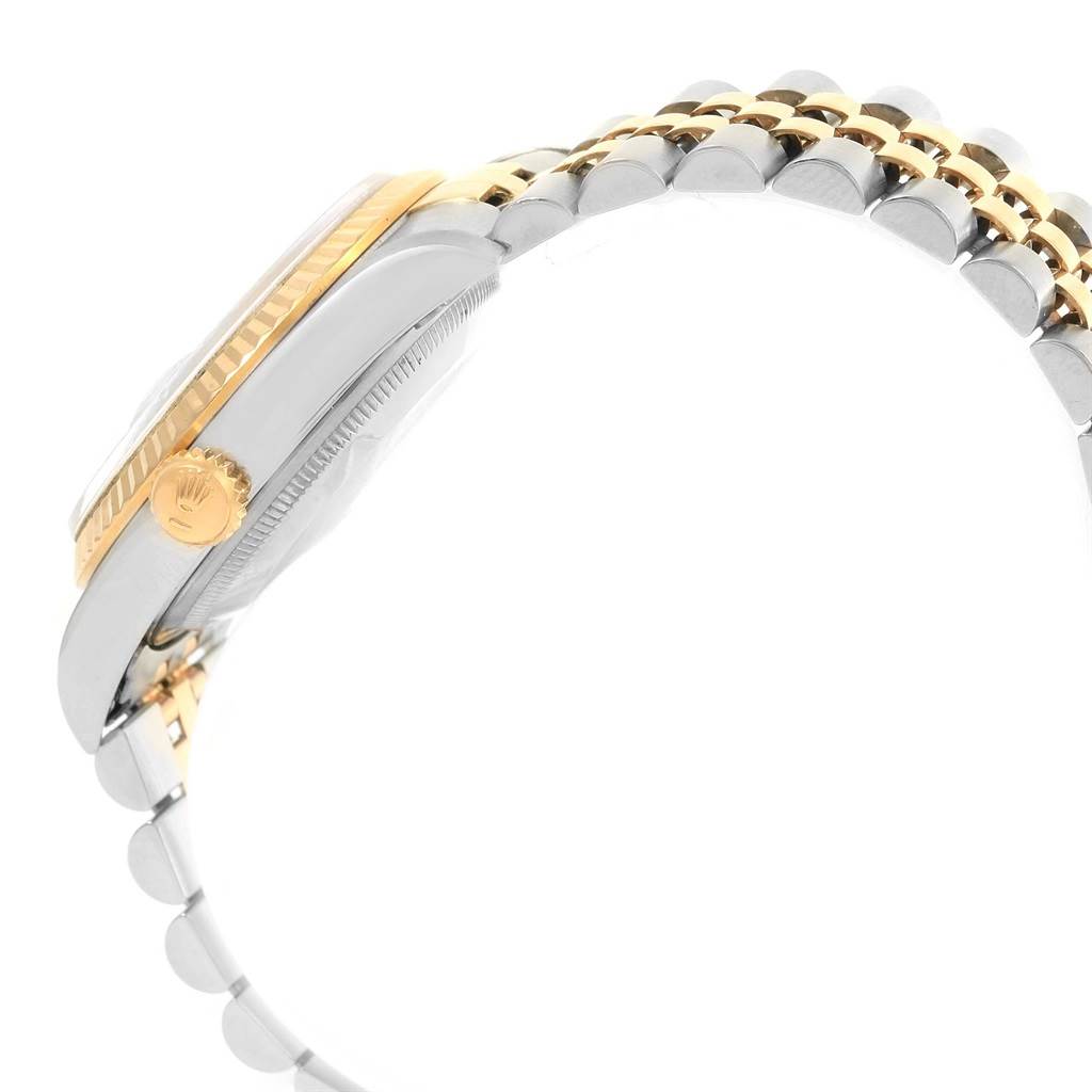 This image shows a side view of a Rolex Datejust 16233 Men's Steel and Gold (two tone) White Dial 16233 Men's Steel and Gold (two tone) White Dial watch, highlighting the crown, case, and part of the two-tone bracelet.