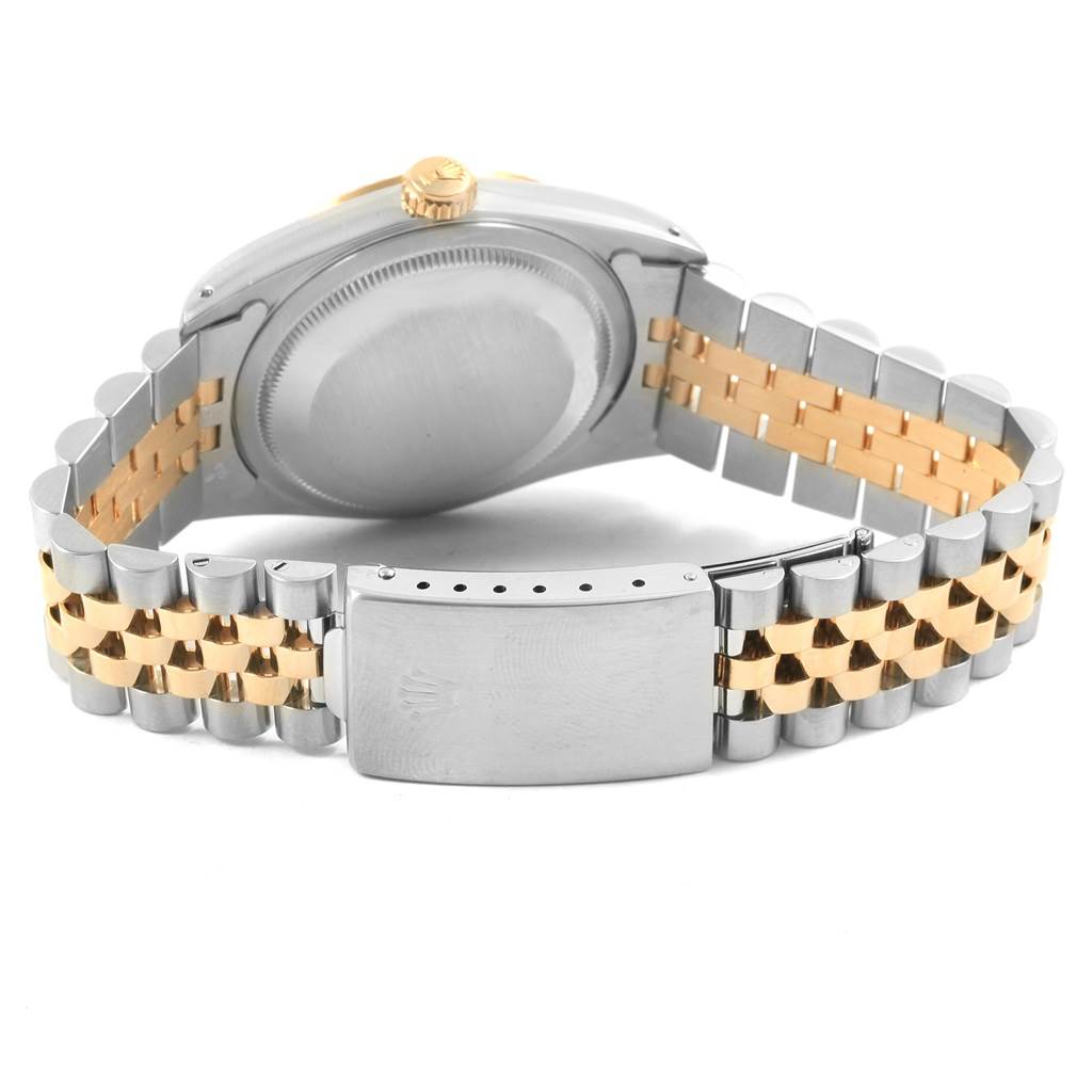 The image shows the back case and two-tone bracelet of a Rolex Datejust 16233 Men's Steel and Gold (two tone) Champagne Dial 16233 Men's Steel and Gold (two tone) Champagne Dial watch from a rear angle.